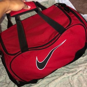 Red Nike duffle bag